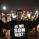 Demonstrators protest in front of the police station in Ferguson, Mo., March 12, 2015. Ferguson has faced sometimes violent protests since the August 2014 shooting death of Michael Brown by a Ferguson police officer.
Scott Olson/Getty Images